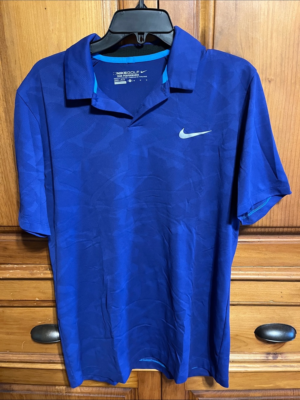 Nike Blue Men's Golf Polo with White Swoosh